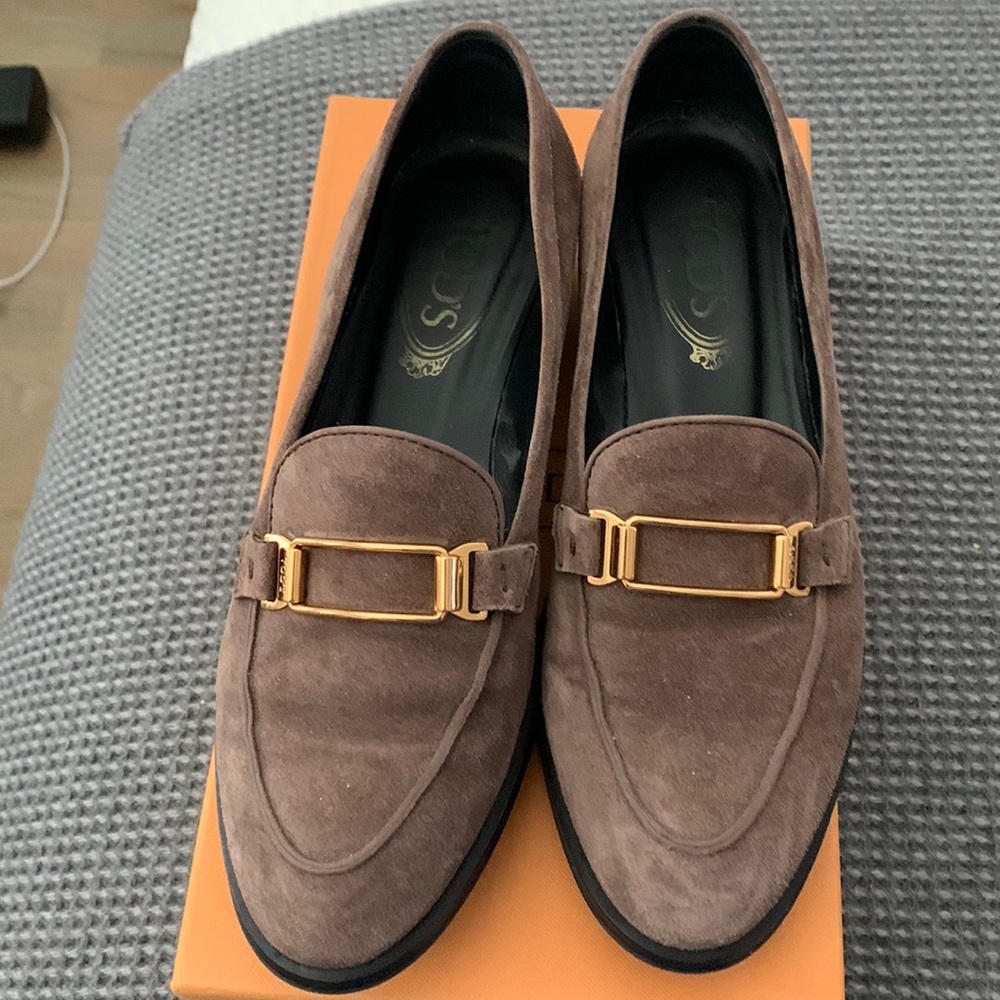 Tod’s taupe loafers from Saks. Have original box and shoe bag.